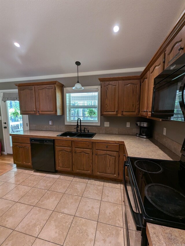 20 Pure Country Rd, Greers Ferry, AR 72067 - kitchen featuring light countertops, a sink, black appliances, and a healthy amount of sunlight