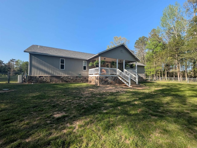 20 Pure Country Rd, Greers Ferry, AR 72067 - rear view of house featuring roof with shingles, fence, a lawn, stairs, and crawl space