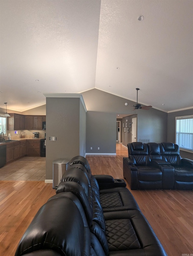 20 Pure Country Rd, Greers Ferry, AR 72067 - living area featuring baseboards, lofted ceiling, a ceiling fan, and light wood-type flooring