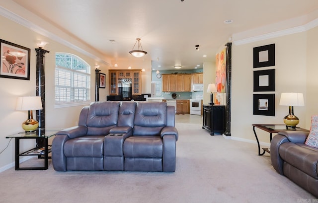 living area with light carpet, baseboards, and ornamental molding