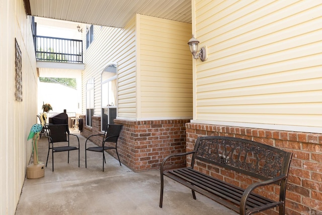 view of patio with a balcony