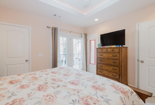 bedroom with access to exterior, visible vents, and recessed lighting