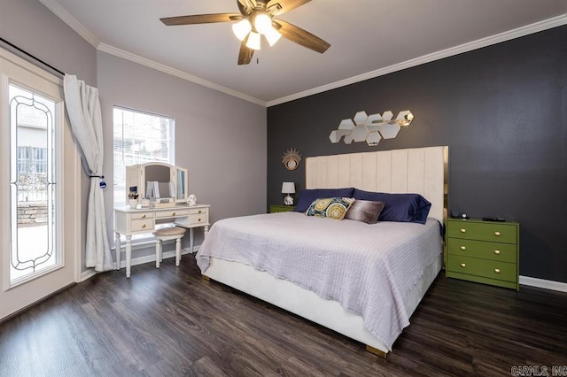 bedroom featuring baseboards, a ceiling fan, wood finished floors, and ornamental molding