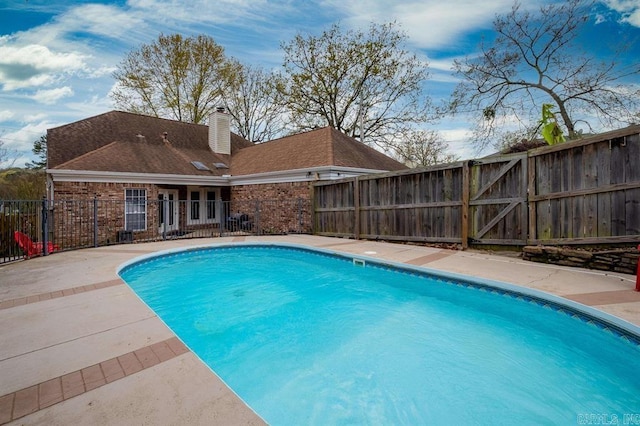 view of pool featuring fence, a patio, and a fenced in pool