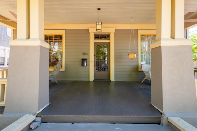 entrance to property with covered porch