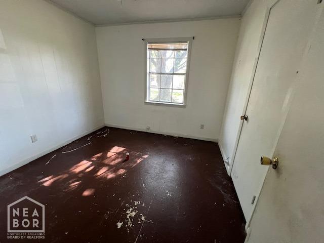 spare room featuring concrete floors