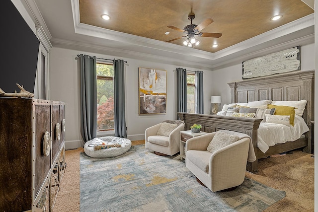 bedroom featuring recessed lighting, baseboards, crown molding, and a raised ceiling