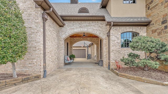view of exterior entry with brick siding