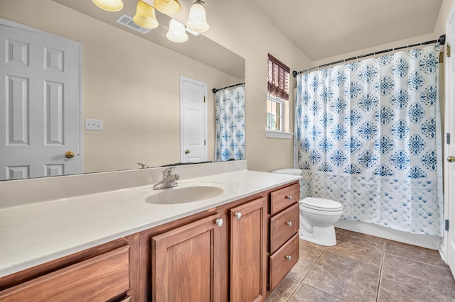 full bathroom with tile patterned floors, toilet, visible vents, curtained shower, and vanity