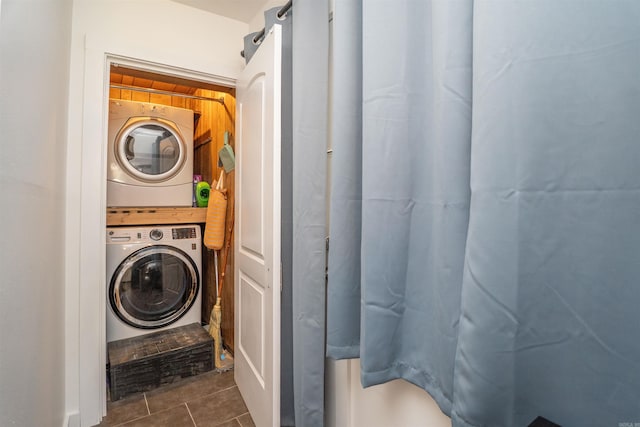 1020 Pine Valley Rd, Little Rock, AR 72207 - full bath with tile patterned floors, stacked washer / dryer, and a shower with shower curtain
