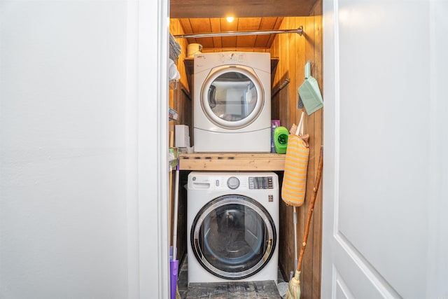 1020 Pine Valley Rd, Little Rock, AR 72207 - laundry room featuring stacked washer / drying machine and laundry area