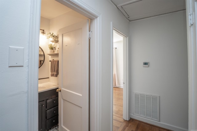 1020 Pine Valley Rd, Little Rock, AR 72207 - corridor with wood finished floors and visible vents