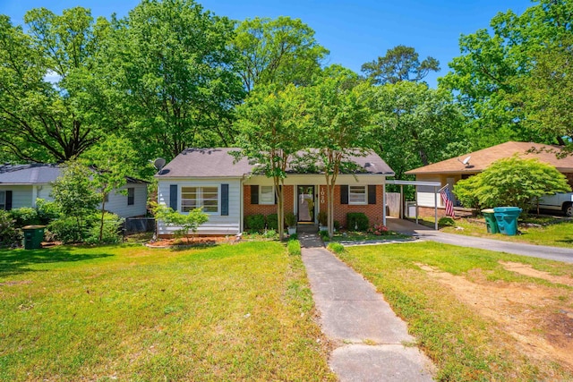 1020 Pine Valley Rd, Little Rock, AR 72207 - ranch-style home featuring brick siding, driveway, a carport, and a front yard