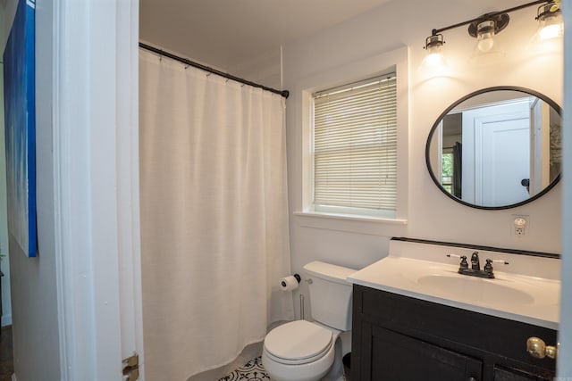 1020 Pine Valley Rd, Little Rock, AR 72207 - bathroom with vanity, a shower with shower curtain, and toilet