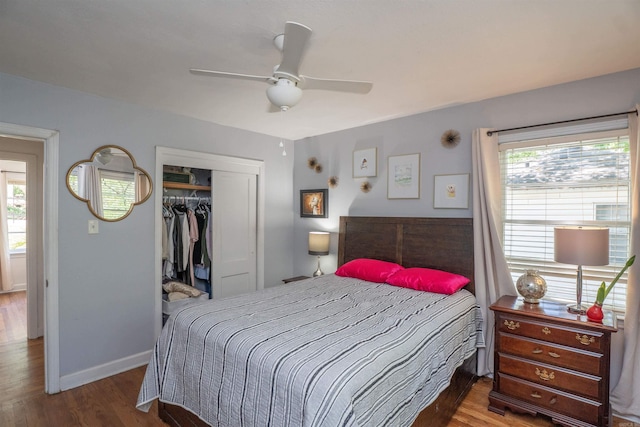 1020 Pine Valley Rd, Little Rock, AR 72207 - bedroom with baseboards, wood finished floors, a closet, and multiple windows