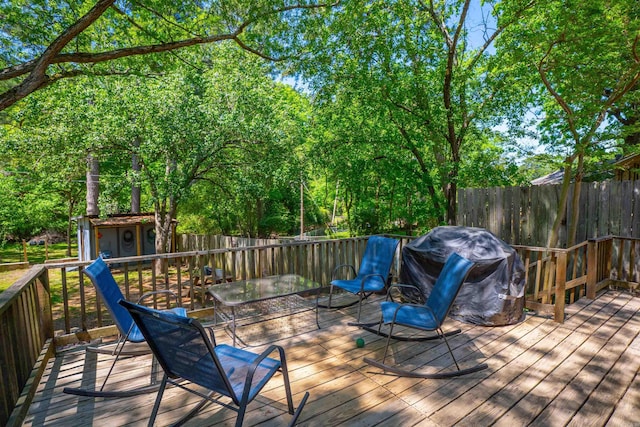 1020 Pine Valley Rd, Little Rock, AR 72207 - wooden terrace with a fenced backyard, an outdoor structure, and area for grilling