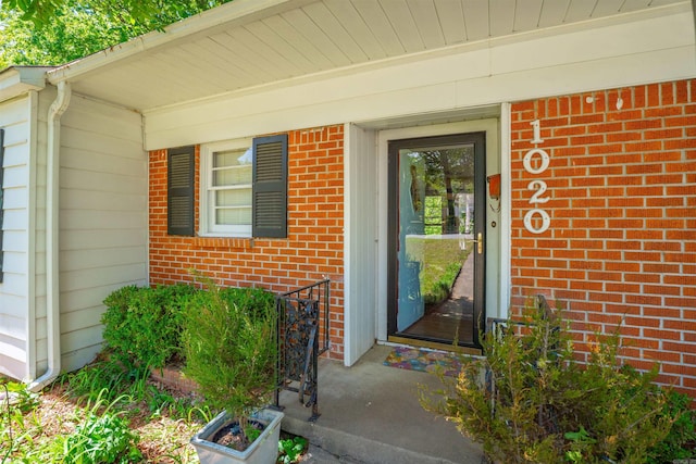 1020 Pine Valley Rd, Little Rock, AR 72207 - property entrance featuring brick siding