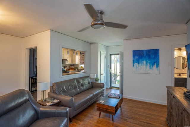 1020 Pine Valley Rd, Little Rock, AR 72207 - living area with wood finished floors, baseboards, and ceiling fan