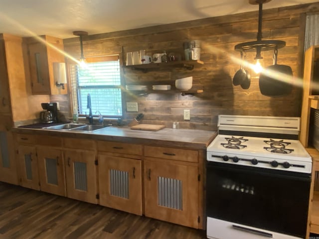 59 Easy St, Mount Ida, AR 71957 - kitchen featuring gas range gas stove, dark wood-style flooring, a sink, visible vents, and wooden walls