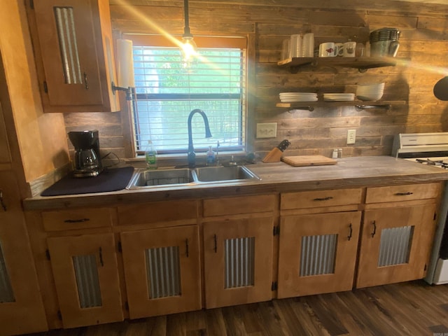 59 Easy St, Mount Ida, AR 71957 - kitchen with white gas range, dark wood-style flooring, wood walls, and a sink