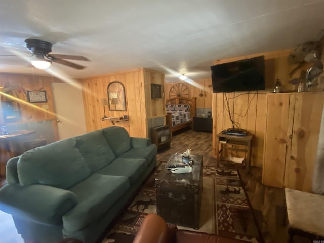 59 Easy St, Mount Ida, AR 71957 - living area featuring wooden walls, wood finished floors, and a ceiling fan
