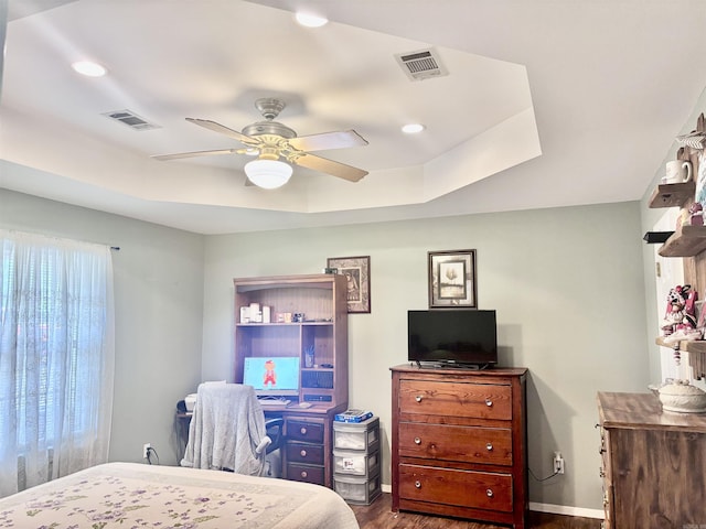 159 Emelia St, Clarksville, AR 72830 - bedroom featuring baseboards, a ceiling fan, wood finished floors, and visible vents
