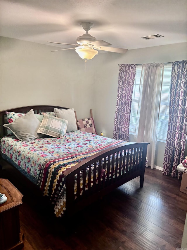 159 Emelia St, Clarksville, AR 72830 - bedroom with visible vents, a ceiling fan, and wood finished floors