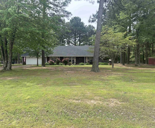 159 Emelia St, Clarksville, AR 72830 - view of front of home featuring an attached garage and a front yard