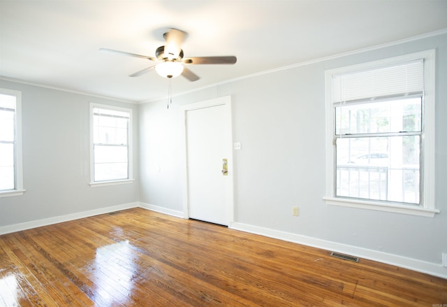 2602 S Taylor St, Little Rock, AR 72204 - unfurnished room featuring hardwood / wood-style floors, ceiling fan, visible vents, and ornamental molding