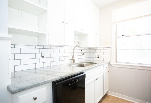 2602 S Taylor St, Little Rock, AR 72204 - kitchen with a sink, backsplash, white cabinetry, light stone counters, and dishwasher