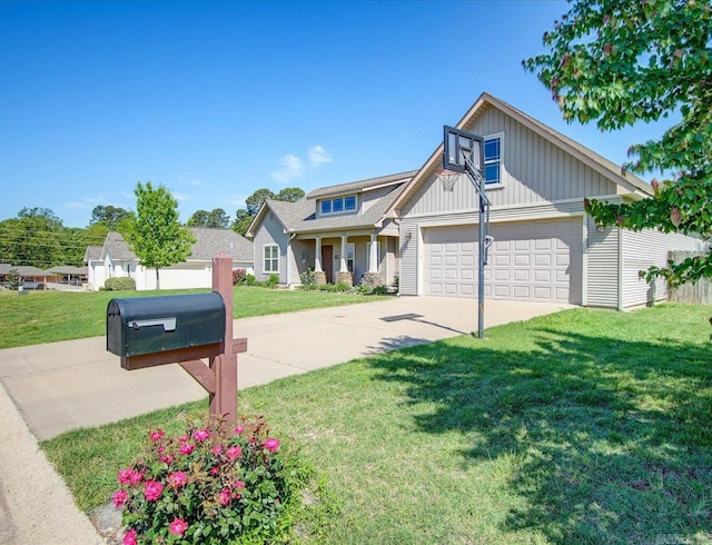 view of front of home featuring an attached garage, driveway, board and batten siding, and a front yard