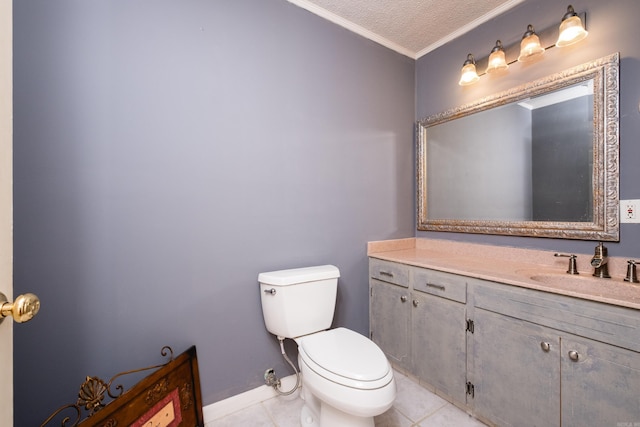 bathroom with tile patterned floors, a textured ceiling, vanity, toilet, and ornamental molding