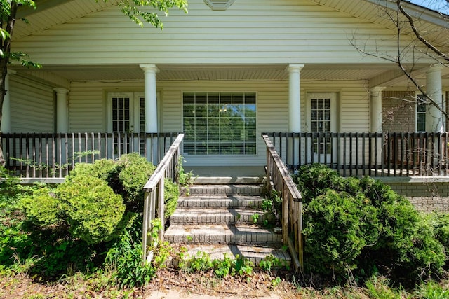 entrance to property with a porch