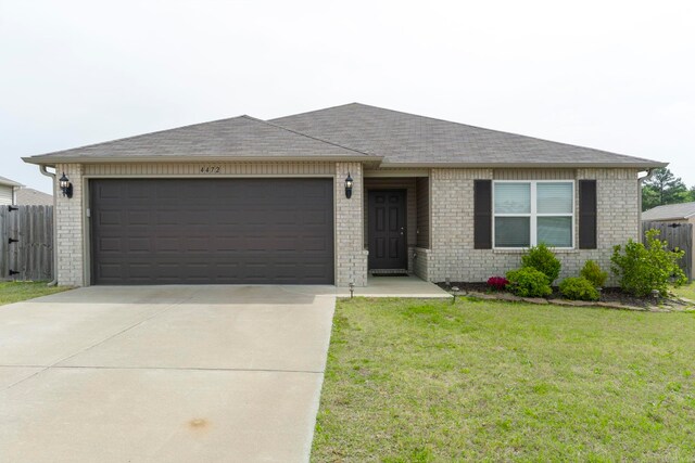 4472 Olympic, Benton, AR 72019 - single story home featuring brick siding, an attached garage, a front yard, and concrete driveway