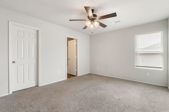 4472 Olympic, Benton, AR 72019 - unfurnished bedroom with baseboards, a ceiling fan, visible vents, and carpet