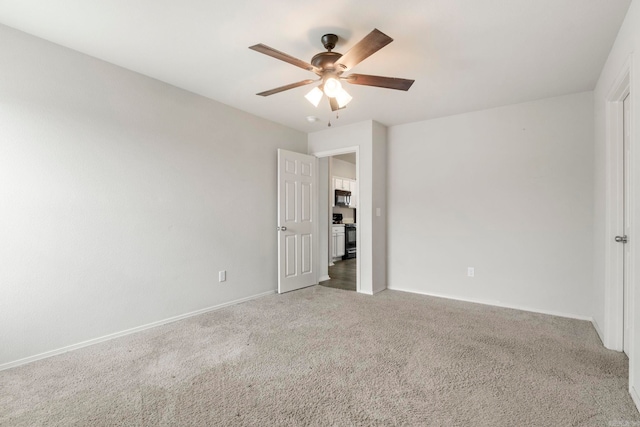 4472 Olympic, Benton, AR 72019 - unfurnished bedroom featuring baseboards, a ceiling fan, and carpet