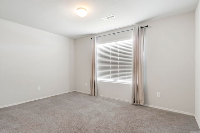 4472 Olympic, Benton, AR 72019 - unfurnished room featuring baseboards, visible vents, and carpet floors