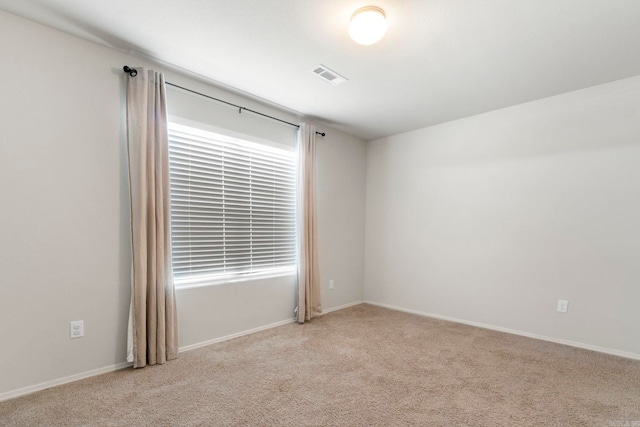 4472 Olympic, Benton, AR 72019 - spare room with visible vents, carpet flooring, and baseboards