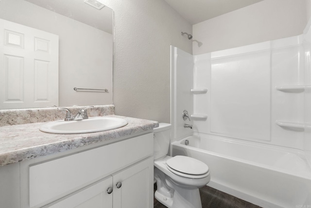 4472 Olympic, Benton, AR 72019 - full bathroom with wood finished floors, visible vents, toilet, vanity, and tub / shower combination