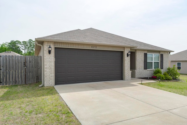 4472 Olympic, Benton, AR 72019 - ranch-style house with brick siding, an attached garage, a shingled roof, and fence