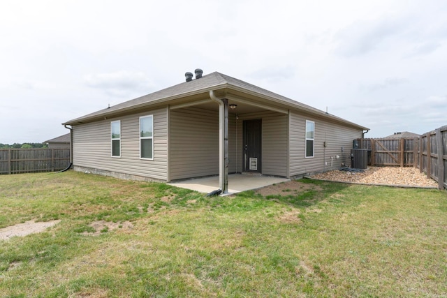 4472 Olympic, Benton, AR 72019 - back of house featuring a yard, a fenced backyard, a patio, and central AC unit