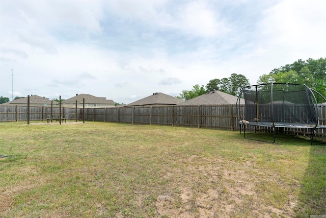 4472 Olympic, Benton, AR 72019 - view of yard featuring a fenced backyard and a trampoline