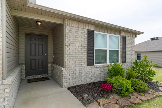 4472 Olympic, Benton, AR 72019 - doorway to property with brick siding
