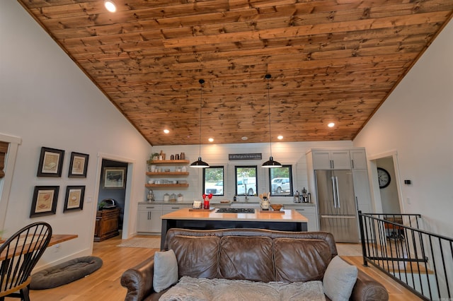 918 Bowith Hollow Rd, Marshall, AR 72650 - living area featuring light wood-style flooring, baseboards, recessed lighting, lofted ceiling, and wood ceiling