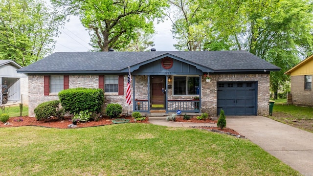 single story home with a front yard, a shingled roof, brick siding, concrete driveway, and an attached garage