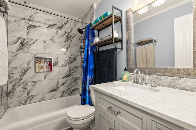 full bath featuring crown molding, toilet, shower / tub combo, and vanity