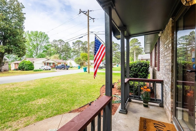 view of yard featuring a porch