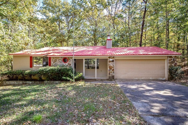 1133 Dave Creek Pkwy, Fairfield Bay, AR 72088 - ranch-style house with driveway, stone siding, metal roof, and a garage