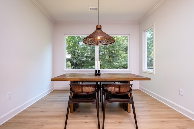 6600 Waverly Dr, Little Rock, AR 72207 - dining space featuring a healthy amount of sunlight, light wood-style floors, and visible vents