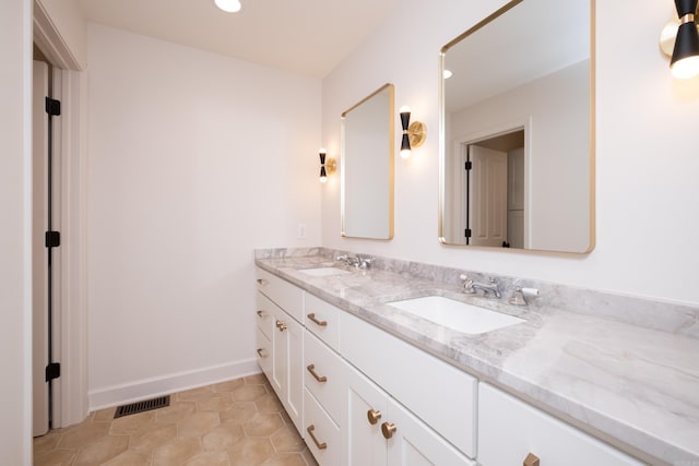 6600 Waverly Dr, Little Rock, AR 72207 - full bath featuring recessed lighting, double vanity, visible vents, and a sink
